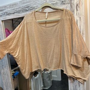 Free people movement, very thin, slightly cropped T-shirt, size small